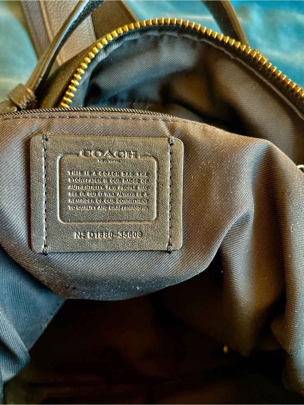 Coach Black Leather Backpack with Gold-Tone Zipper